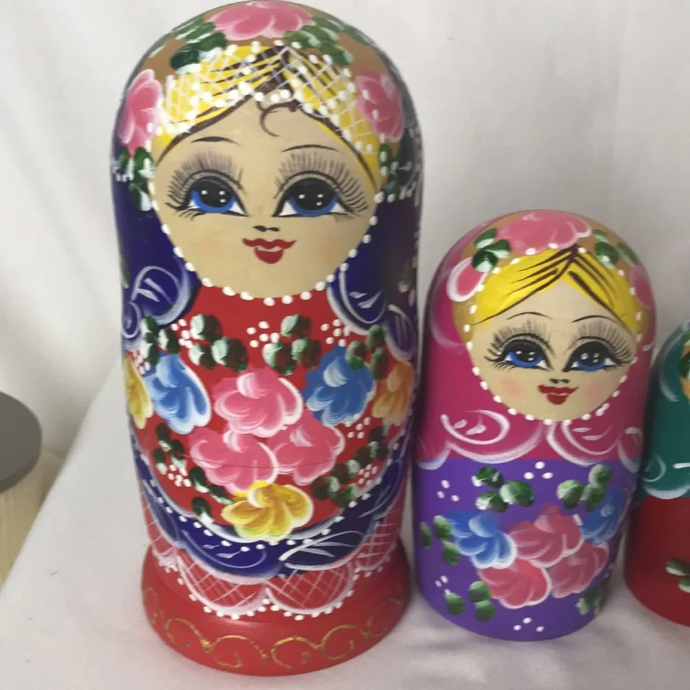 Beautifully decorated nesting dolls set